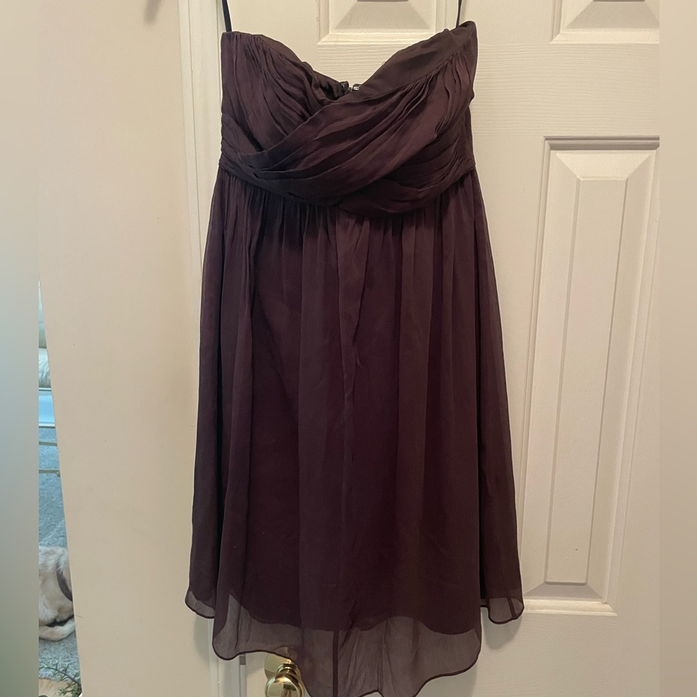 J Crew formal cocktail dress in plum. Silk outer shell. Size is 4P, NWOT.